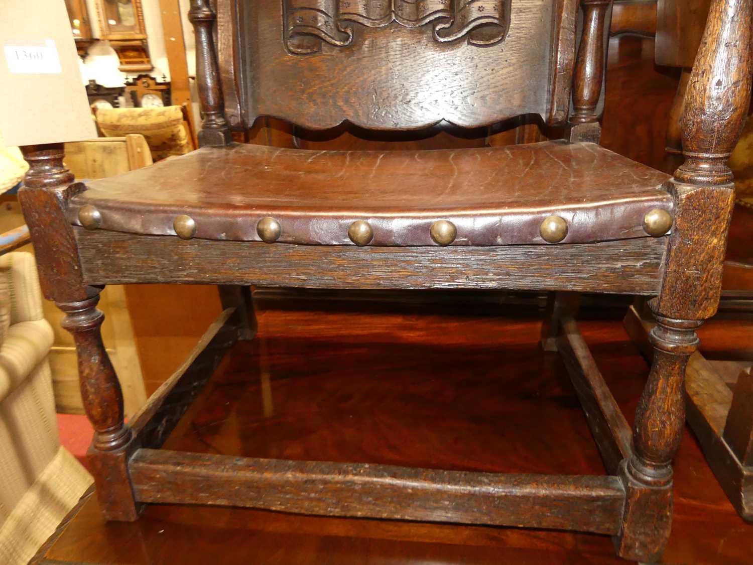 A joined oak fold-over monks chair, having a studded tan leather seat, w.52cm - Image 3 of 3