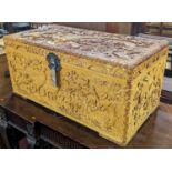 A Chinese heavily carved camphorwood hinge top blanket chest, decorated with wild & wading birds