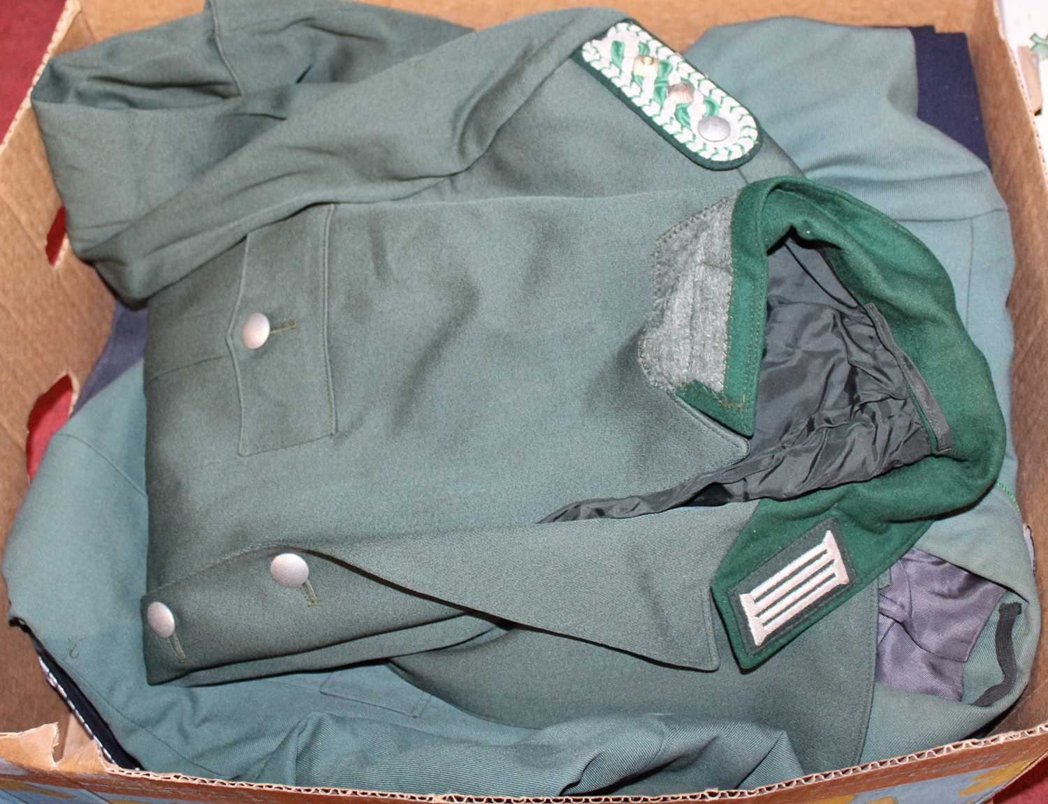A Bavarian Police tunic, in green cloth, with four front fastening pockets, and badge to the left - Image 2 of 2
