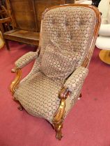 A mid-Victorian mahogany framed and buttoned floral fabric upholstered scroll open armchair, w.69cm