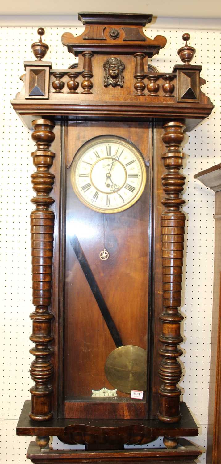 A circa 1900 Vienna walnut cased droptrunk regulator, with weight, h.132cm