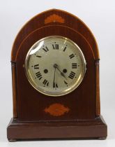 An Edwardian inlaid mahogany lancet top mantel clock having an eight-day spring driven movement