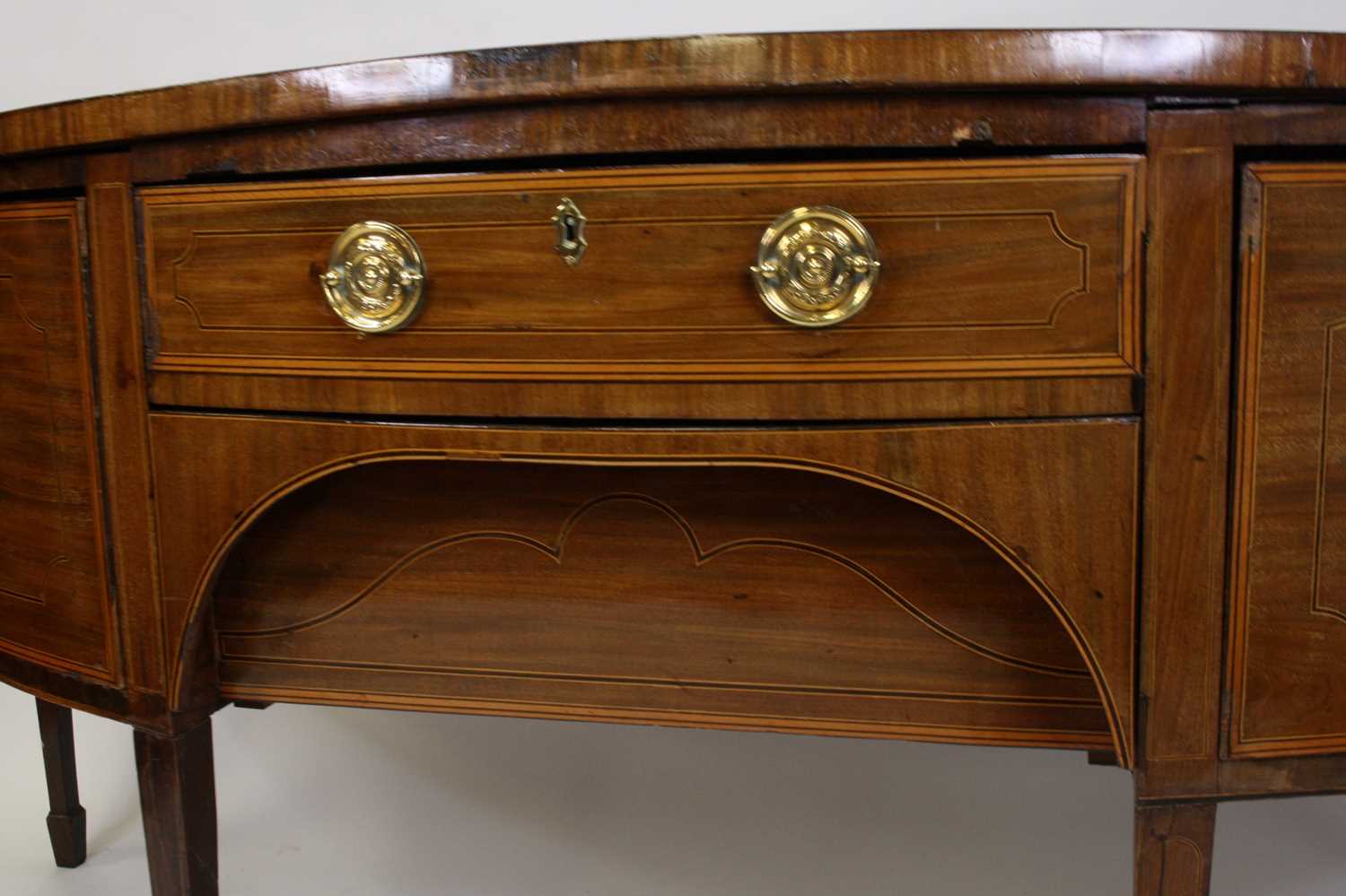 A George III mahogany and inlaid demi-lune sideboard, of large proportions, having a centre frieze - Image 4 of 4