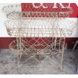 Two 19th century painted wried metal plant stands, each approx width 100cm Generally rusty and