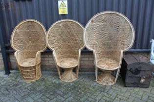 Three various wicker peacock chairs