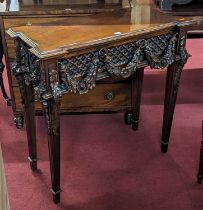 A contemporary cherry wood console table in the French taste, the frieze decorated with floral