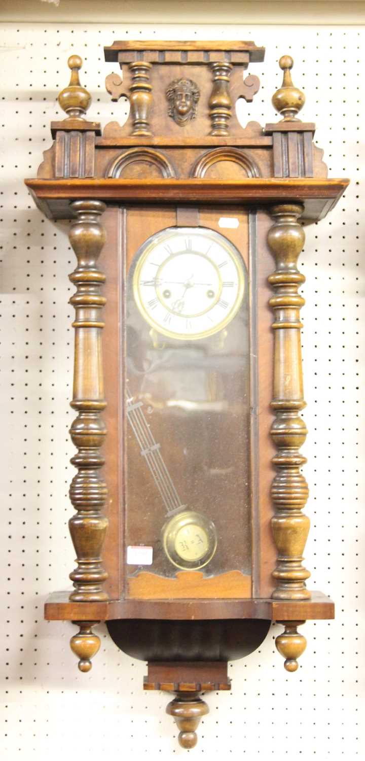 A circa 1900 Vienna droptrunk wall clock, h.92cm; together with another continental droptrunk wall