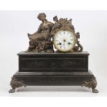 A late Victorian polished slate mantel clock, of architectural outline (tarnished), h.36cm; together