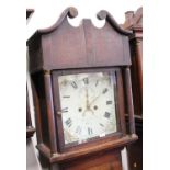 An early 19th century oak and mahogany crossbanded long case clock, having an indistinctly signed