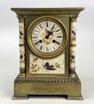 A late 19th century gilt bronze and soft paste porcelain mantel clock (lacking marble top) having