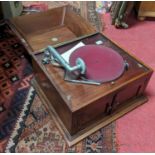 A 1930s walnut cased hinged table-top gramophone