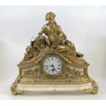 A French gilt brass and marble mantel clock, 20th century, the whole surmounted with a maiden and