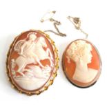 Two oval shell cameo brooches, one being 9ct yellow gold depicting Diana goddess of hunting