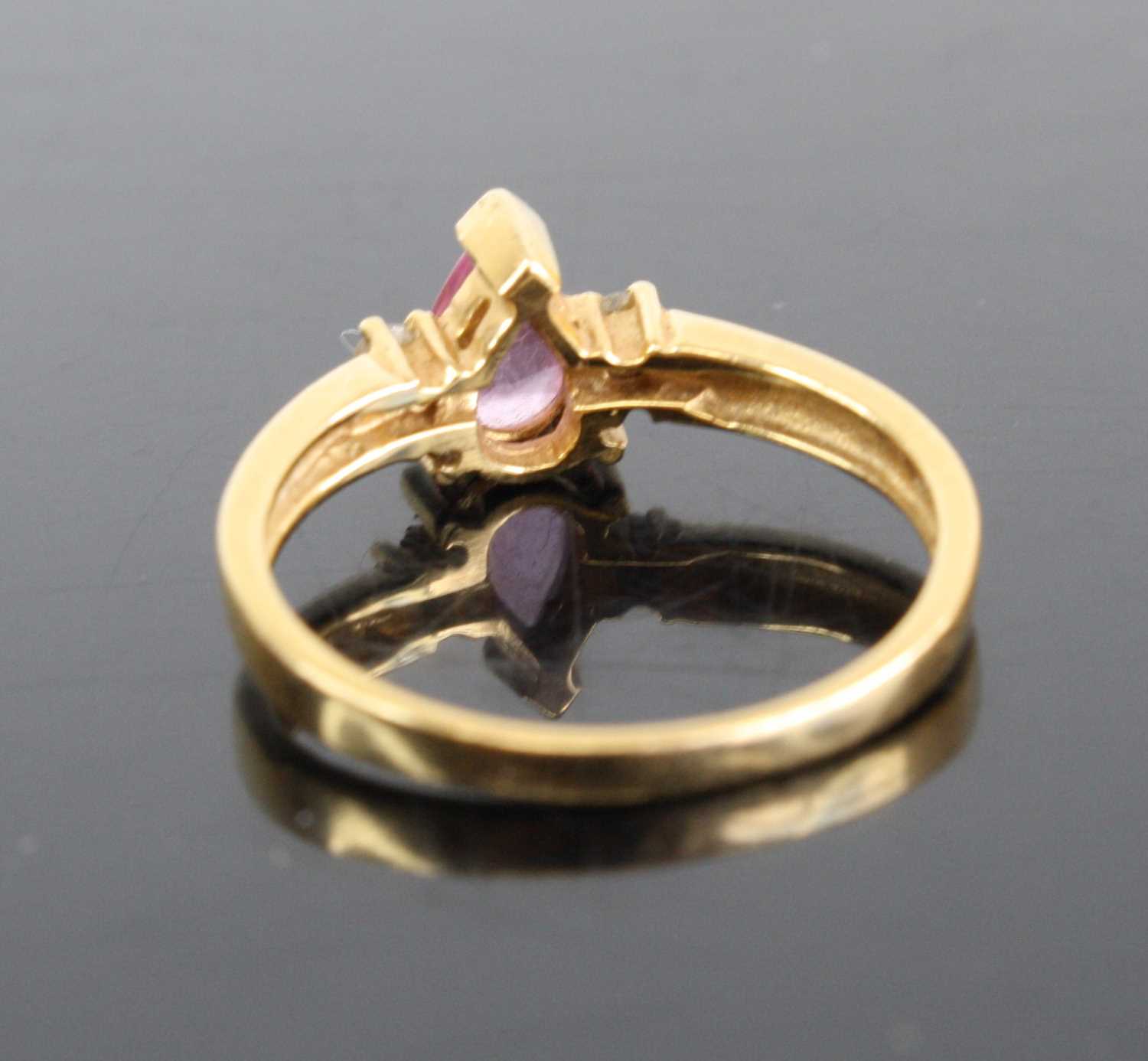 A modern 18ct gold pink sapphire and diamond highlight dress ring, the pear cut sapphire measuring - Image 3 of 3