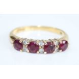 An 18ct yellow gold, ruby and diamond half eternity ring, featuring four round rubies alternating