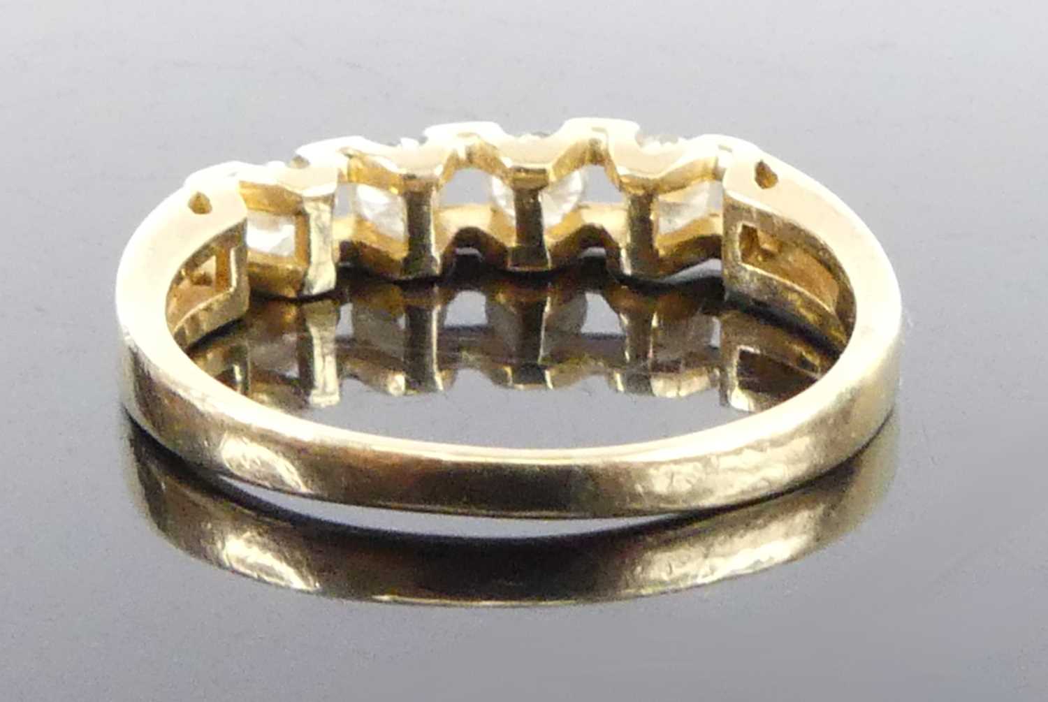 A yellow metal diamond half hoop eternity ring, featuring four round brilliant cut diamonds in - Image 3 of 6