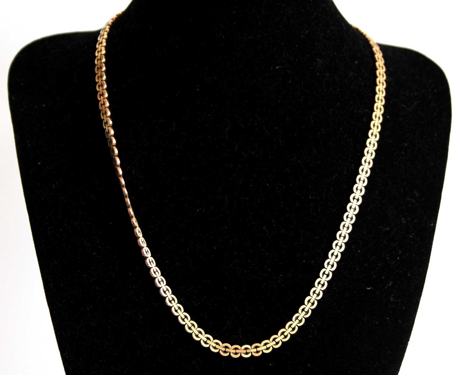 An Italian 9ct gold fancy circular link necklace, 18.5g, length 43cm Light surface/age wear only.