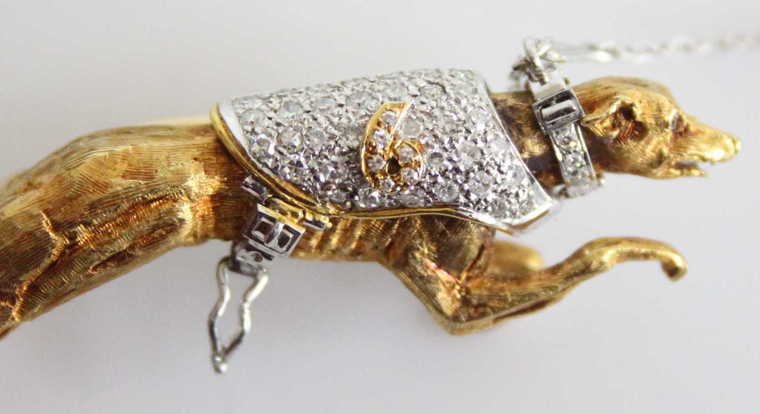 A yellow and white metal greyhound brooch, having pavé set diamond jacket and removable collar, with - Image 7 of 7