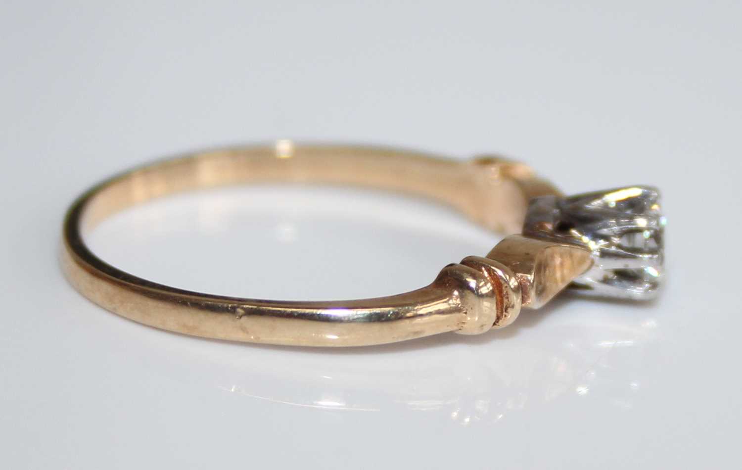 A 9ct gold diamond solitaire ring, the claw set round brilliant weighing approx 0.2 carats, 1.7g, - Image 3 of 7