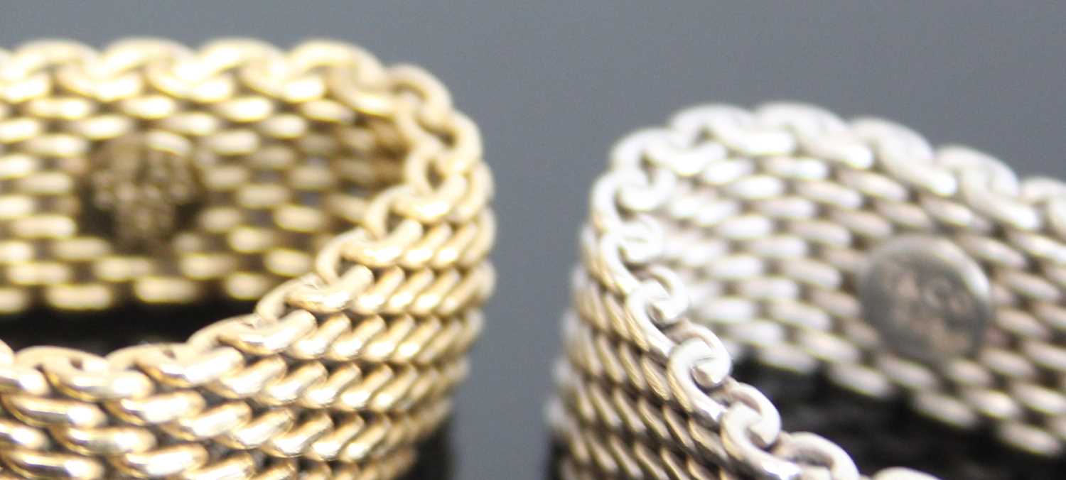 Two marked Tiffany & Co rings. One yellow metal 10mm wide mesh link ring, finger size T approx. - Image 2 of 4