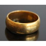 A 22ct gold court shaped wedding band, sponsor JG, 7.9g, size L