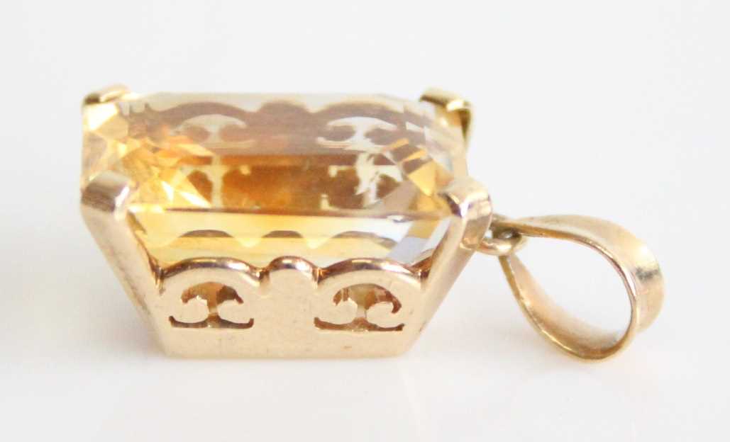 A yellow metal citrine pendant, featuring a rectangular cut citrine in a four-claw setting, - Image 2 of 4