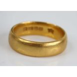 A 22ct gold court shaped wedding band, sponsor BS, 7.3g, size L