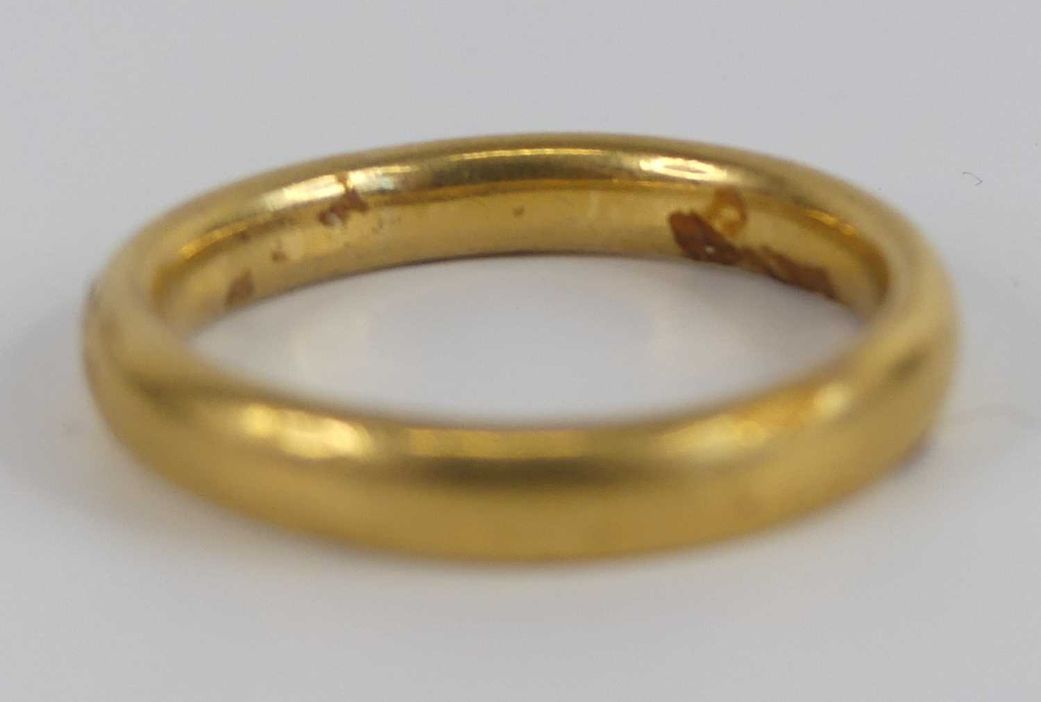 A yellow metal 3.2mm court shaped wedding band, size approx N, gross weight 5.6g, stamped and tested - Image 4 of 6