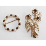 Two 9ct yellow gold, garnet and cultured pearl brooches, one designed as a floral spray with three