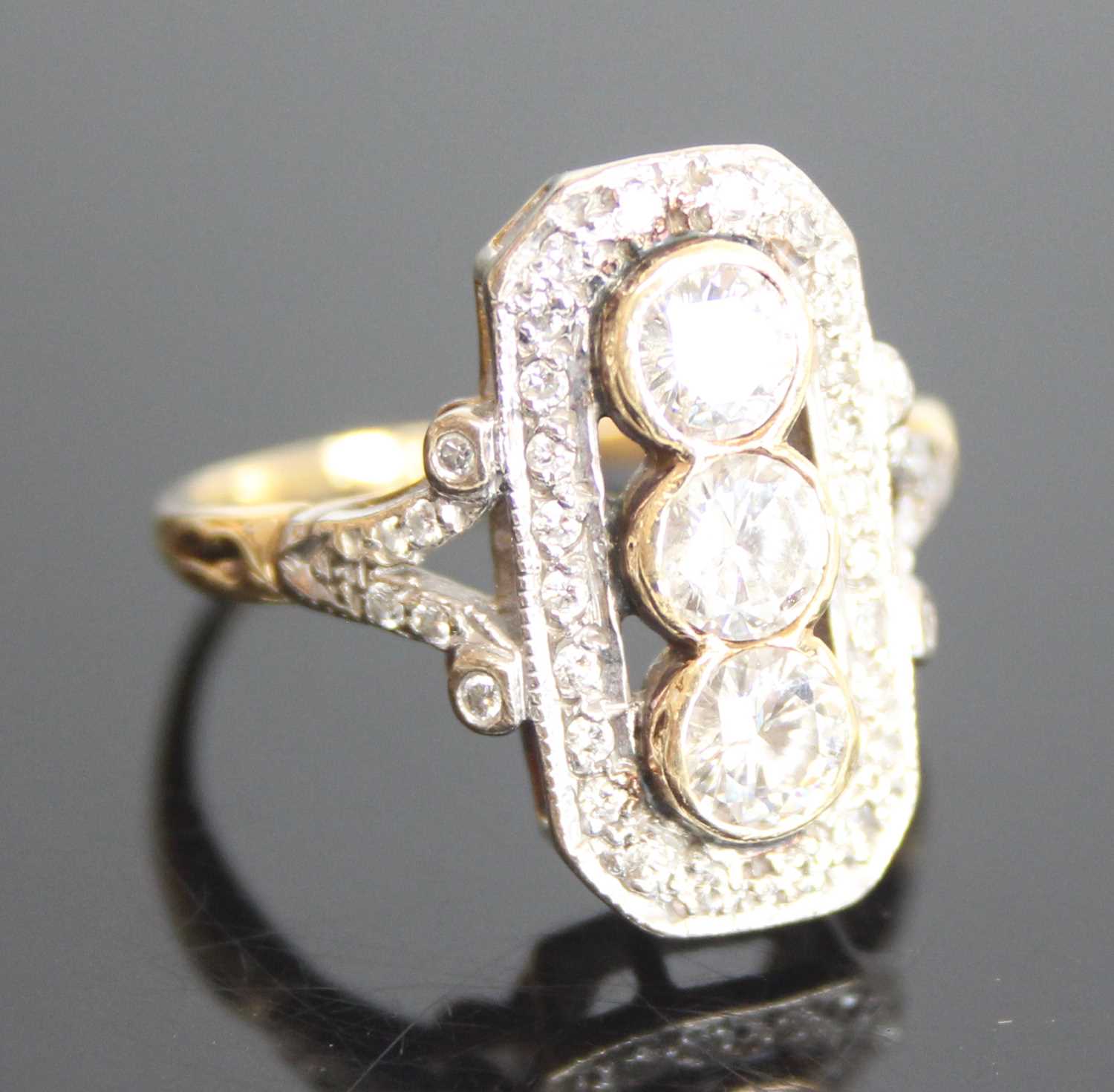 An 18ct yellow and white gold Art Deco style panel ring comprising 3 round brilliant cut diamonds in - Image 2 of 7