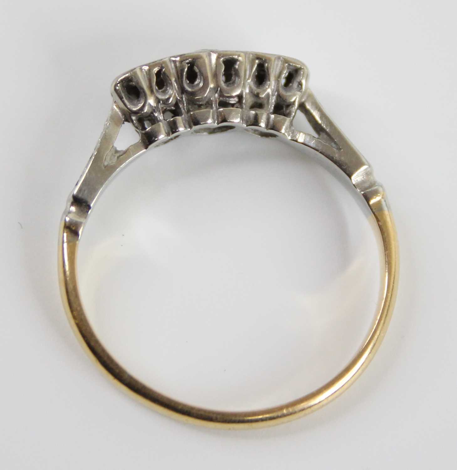 A yellow and white metal diamond three-stone ring, having three single cut diamond in heart shaped - Image 5 of 6