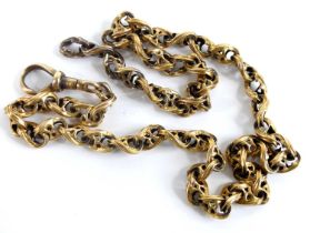 A yellow metal fancy figure-of-eight style link Albert chain, with swivel clasp, length 350mm, chain