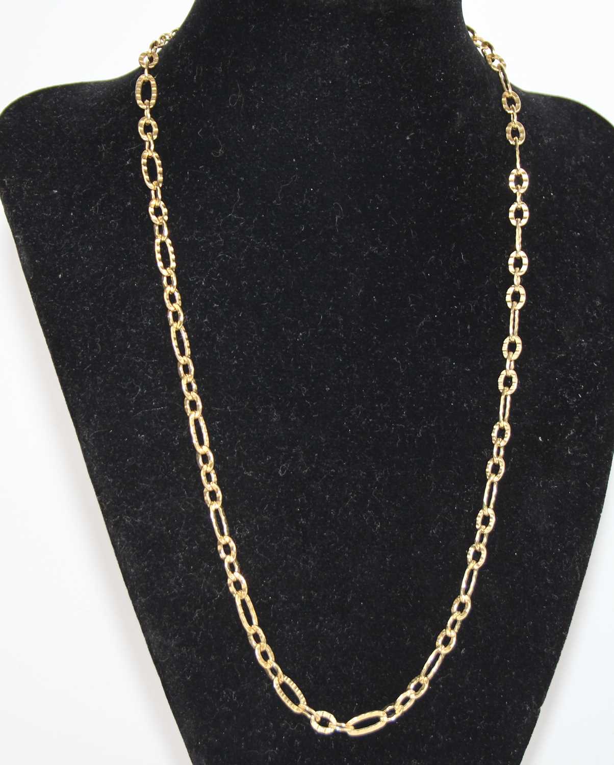 A modern 9ct gold textured oval link necklace, 7.8g, length 25cm