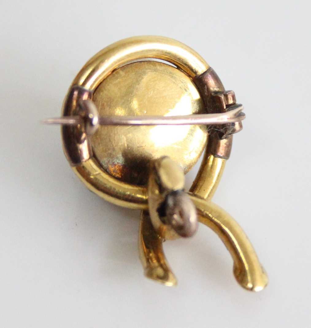 A late Victorian yellow metal mourning brooch, having a round 12.5mm garnet cabochon and a 2.35mm - Image 4 of 4