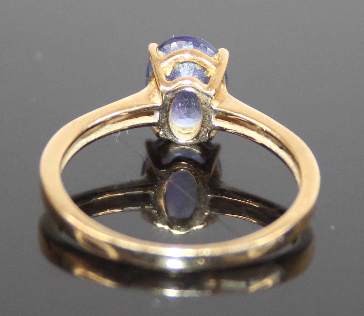 A 9ct gold tanzanite single stone pendant, featuring a cushion cut tanzanite in claw setting, - Image 4 of 9