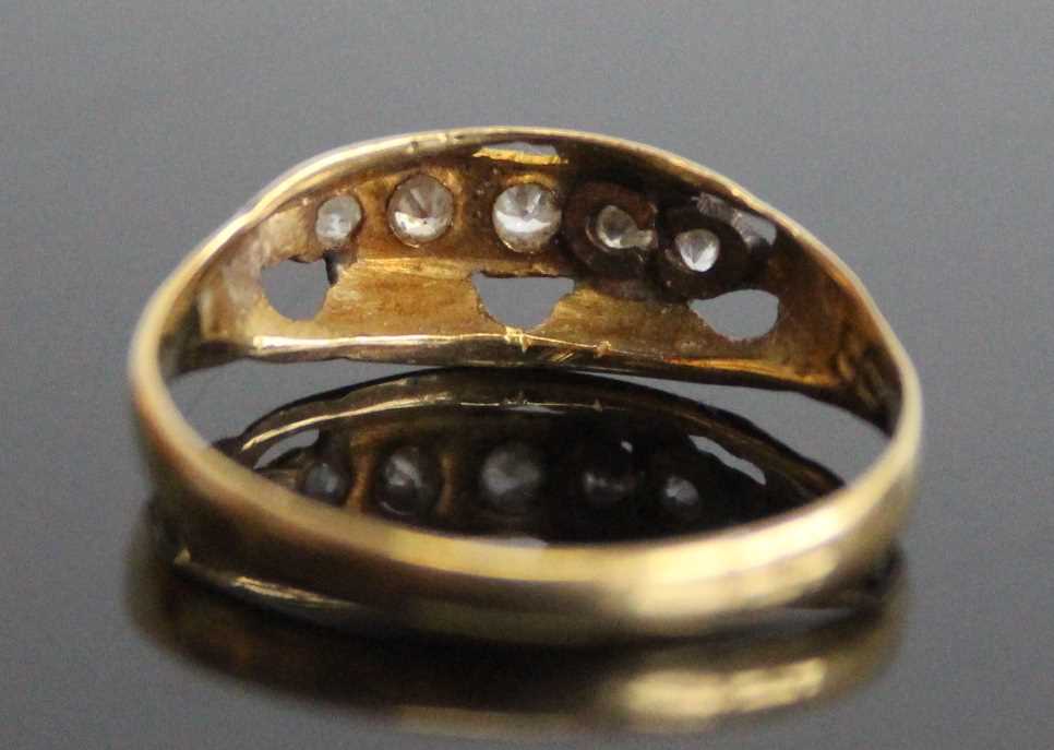 A yellow metal diamond half hoop ring, comprising five graduated Old European cut diamonds in boat - Image 3 of 6