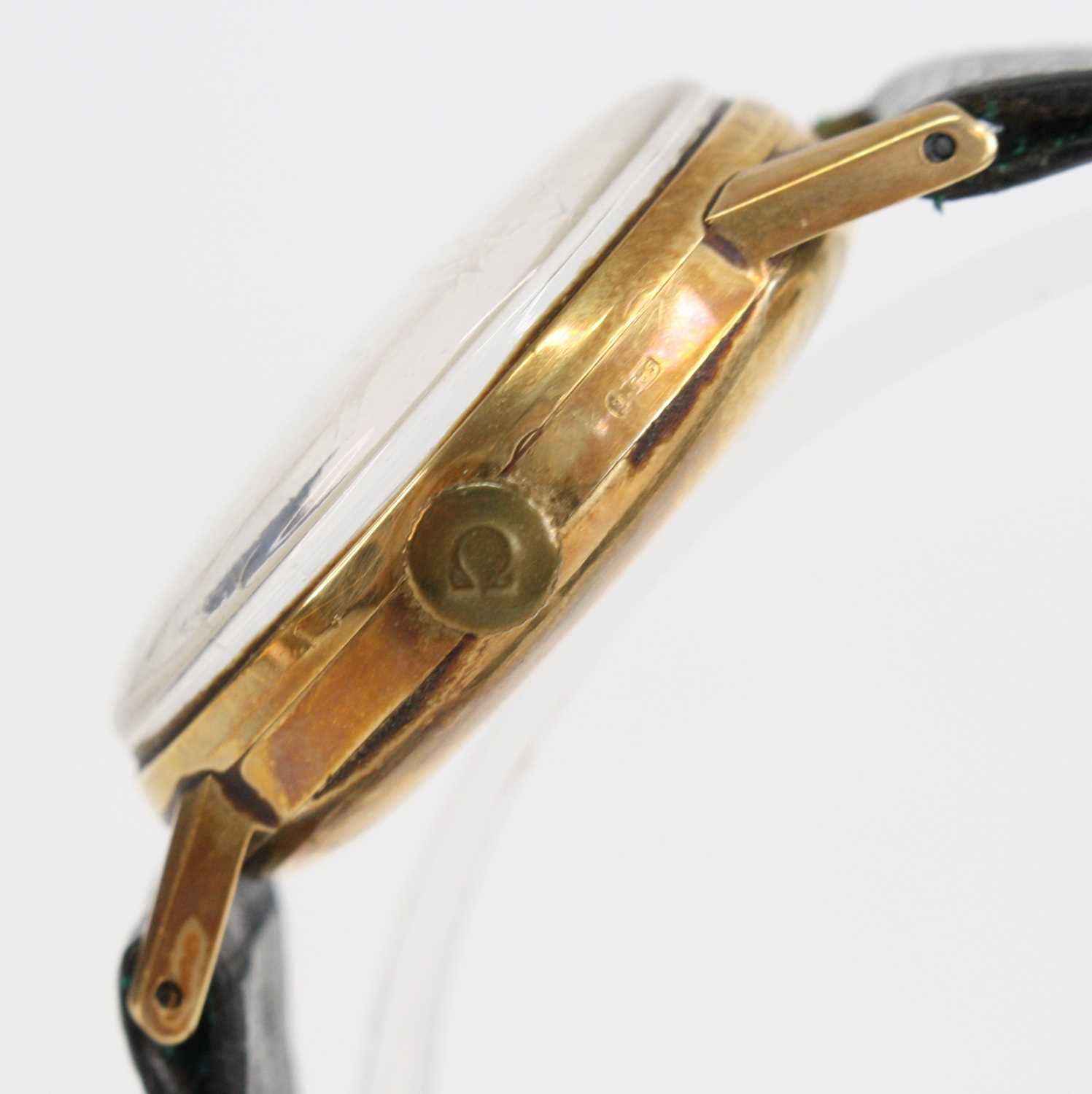 A 14ct yellow gold vintage Omega manual wind wristwatch, having a round cream baton dial and - Image 3 of 6