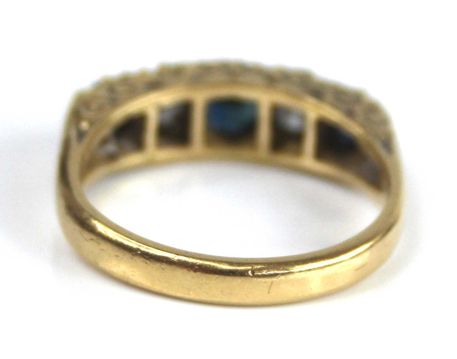 An 18ct yellow gold, sapphire and diamond half eternity ring, comprising three graduated round - Image 3 of 6