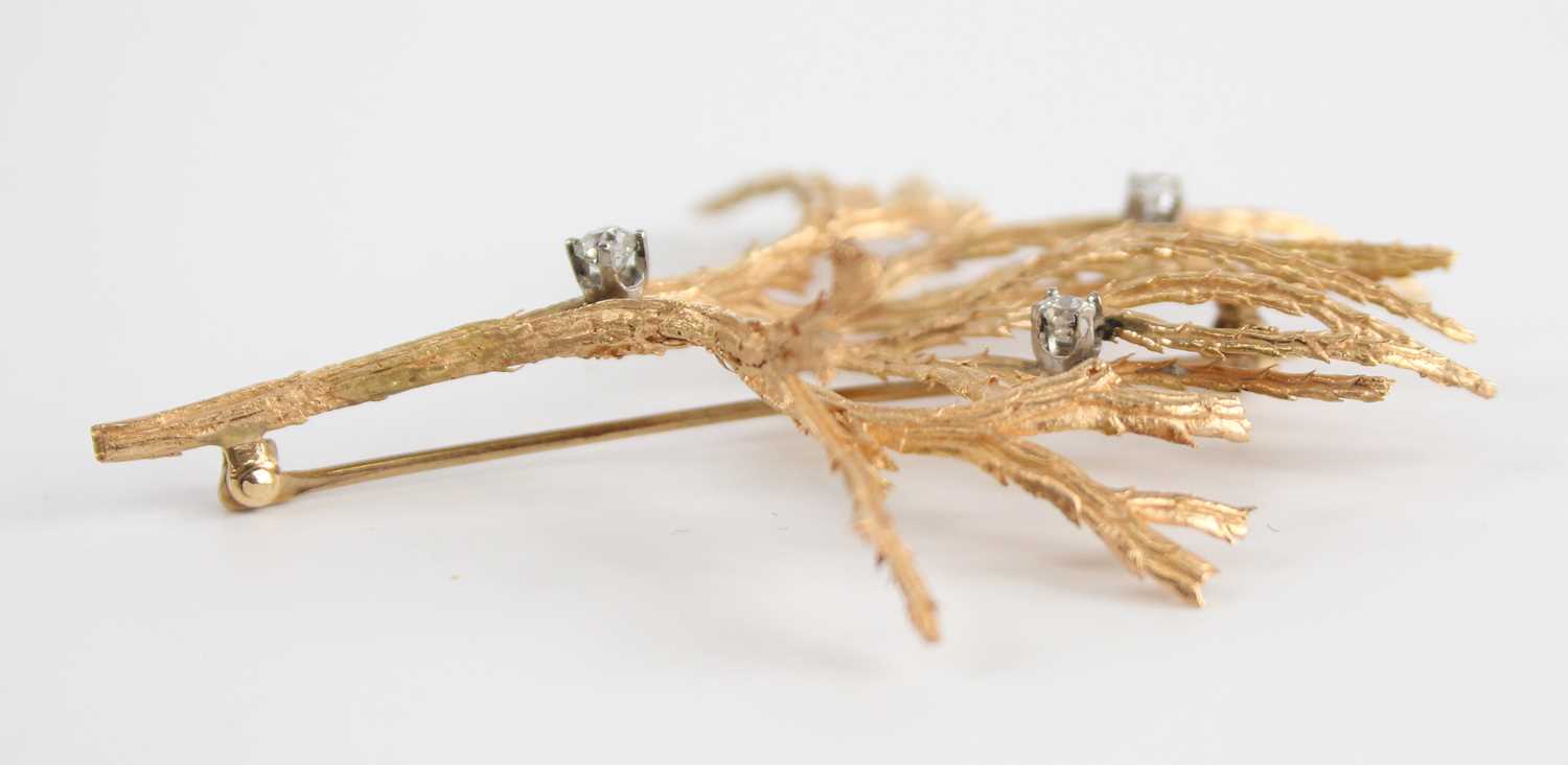 A yellow metal diamond set brooch, in the form of textured branches with three Old European cut - Image 3 of 4