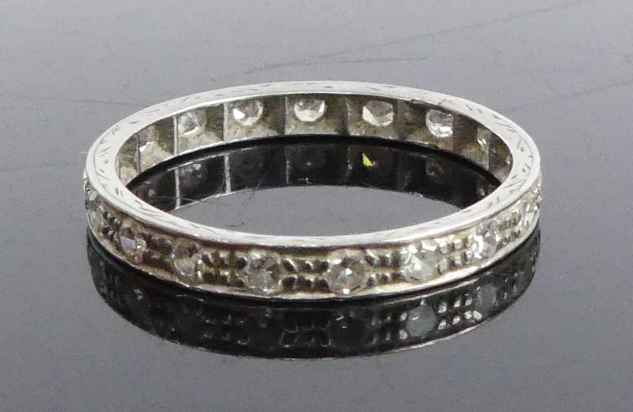 A white metal diamond full hoop eternity ring, comprising 19 single cut diamonds in grain and - Image 2 of 5