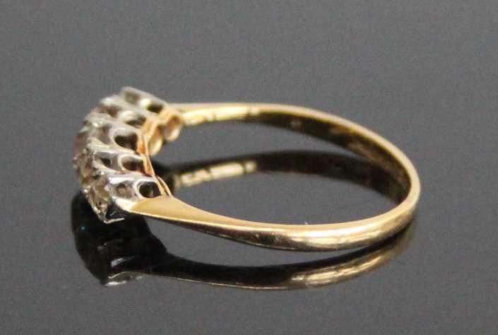 A yellow and white metal diamond half eternity ring, comprising five graduated Old European cut - Image 4 of 6