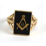 A gent's 9ct gold black onyx set masonic signet ring, setting measurements 16 x 12mm, 4.5g, size S½