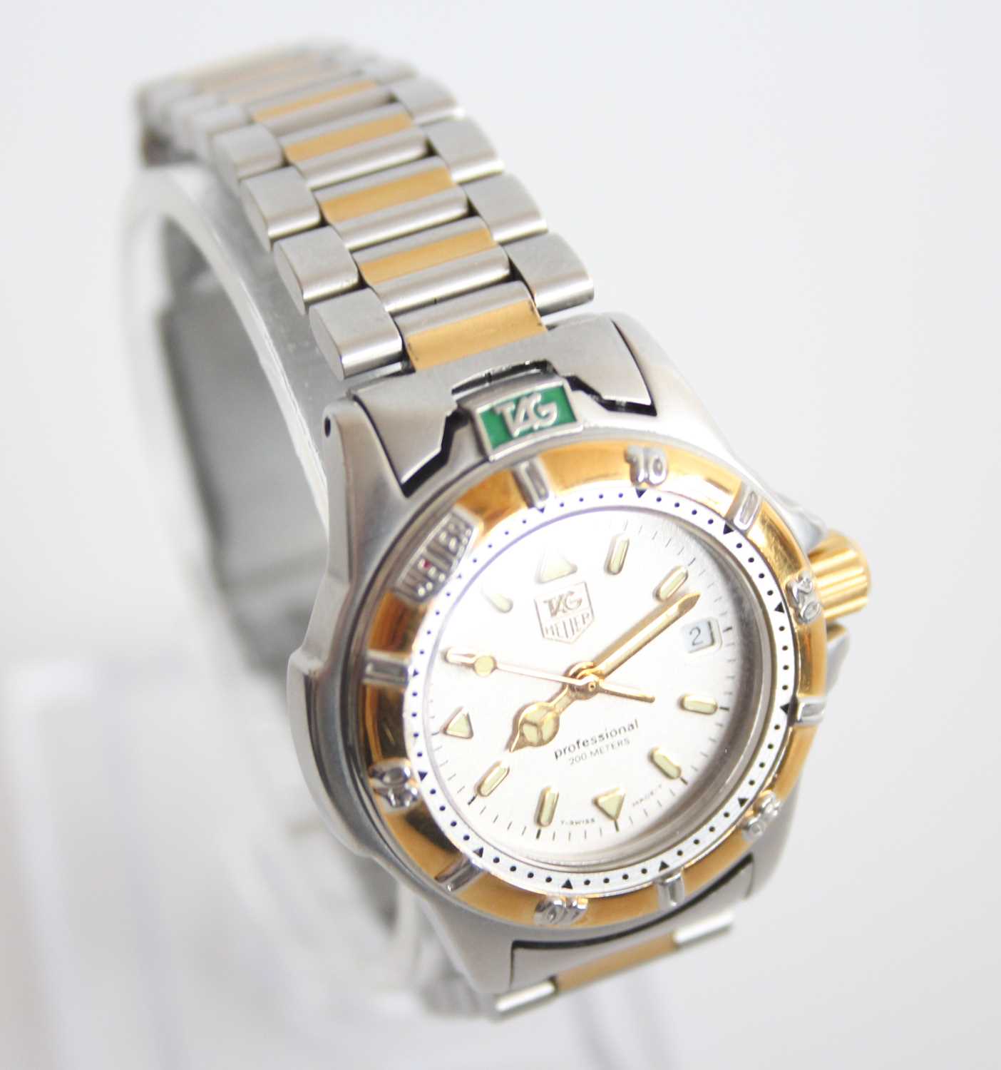 A ladies bi-metal Tag Heuer professional quartz watch with round cream baton dial and date at 3, - Image 2 of 8