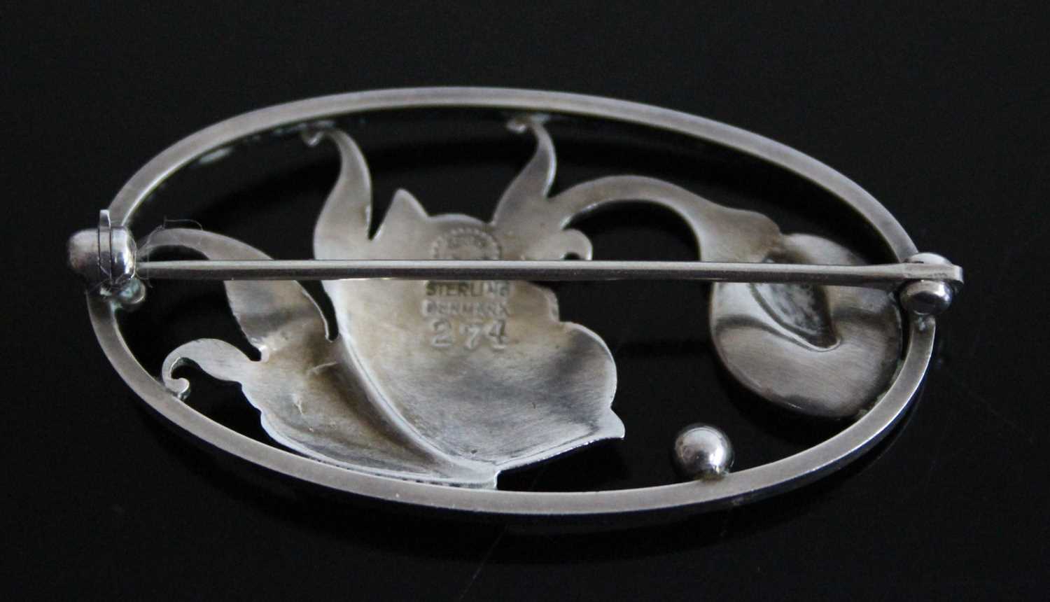 A 1940's Georg Jensen sterling silver floral brooch by Gundorph Albertus, comprising a stylised - Image 2 of 3