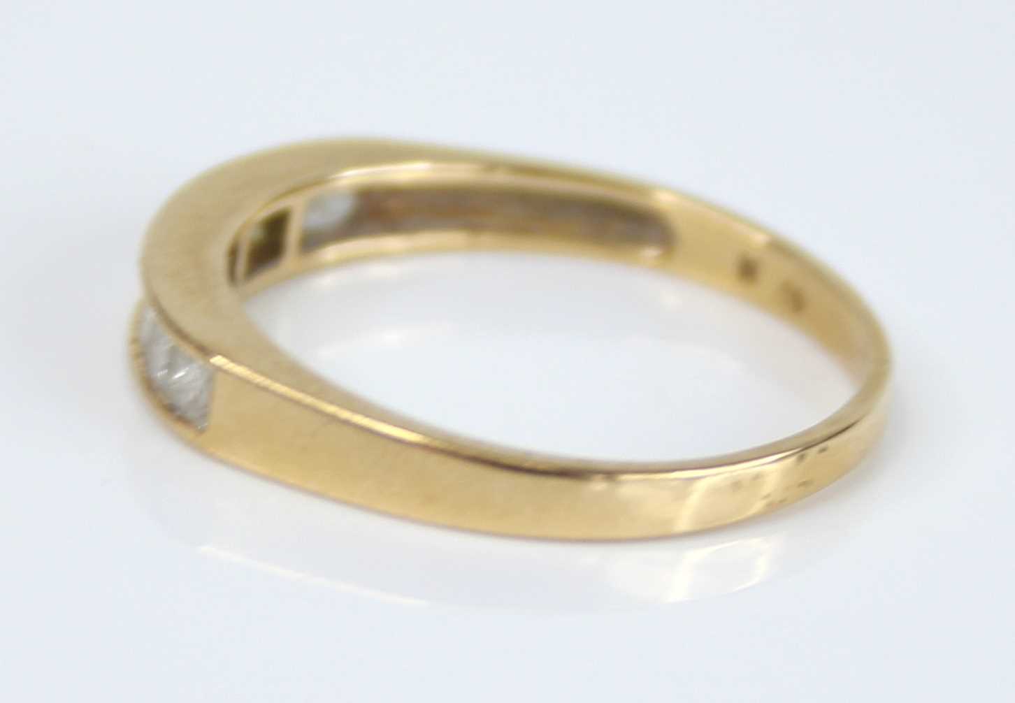 A modern 18ct gold diamond half hoop ring, arranged as seven channel set princess cuts, total - Image 5 of 7