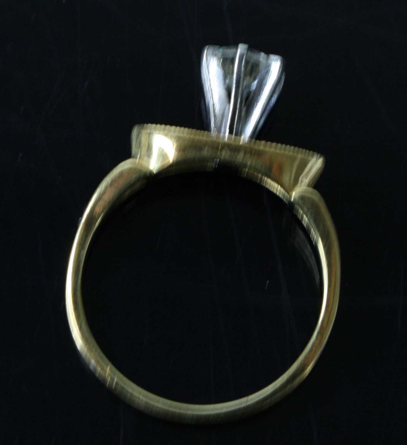A yellow and white metal contemporary diamond solitaire ring, comprising a round brilliant cut - Image 6 of 7