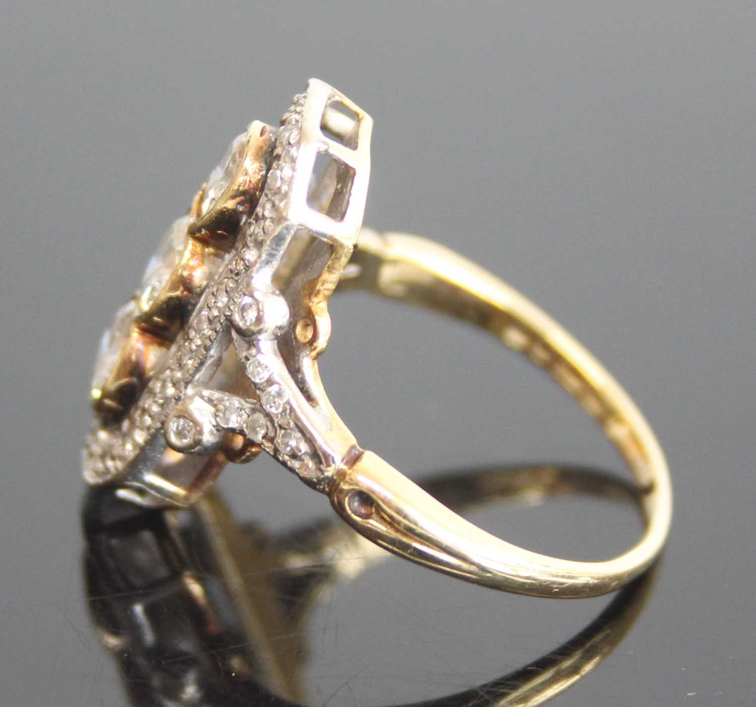 An 18ct yellow and white gold Art Deco style panel ring comprising 3 round brilliant cut diamonds in - Image 5 of 7