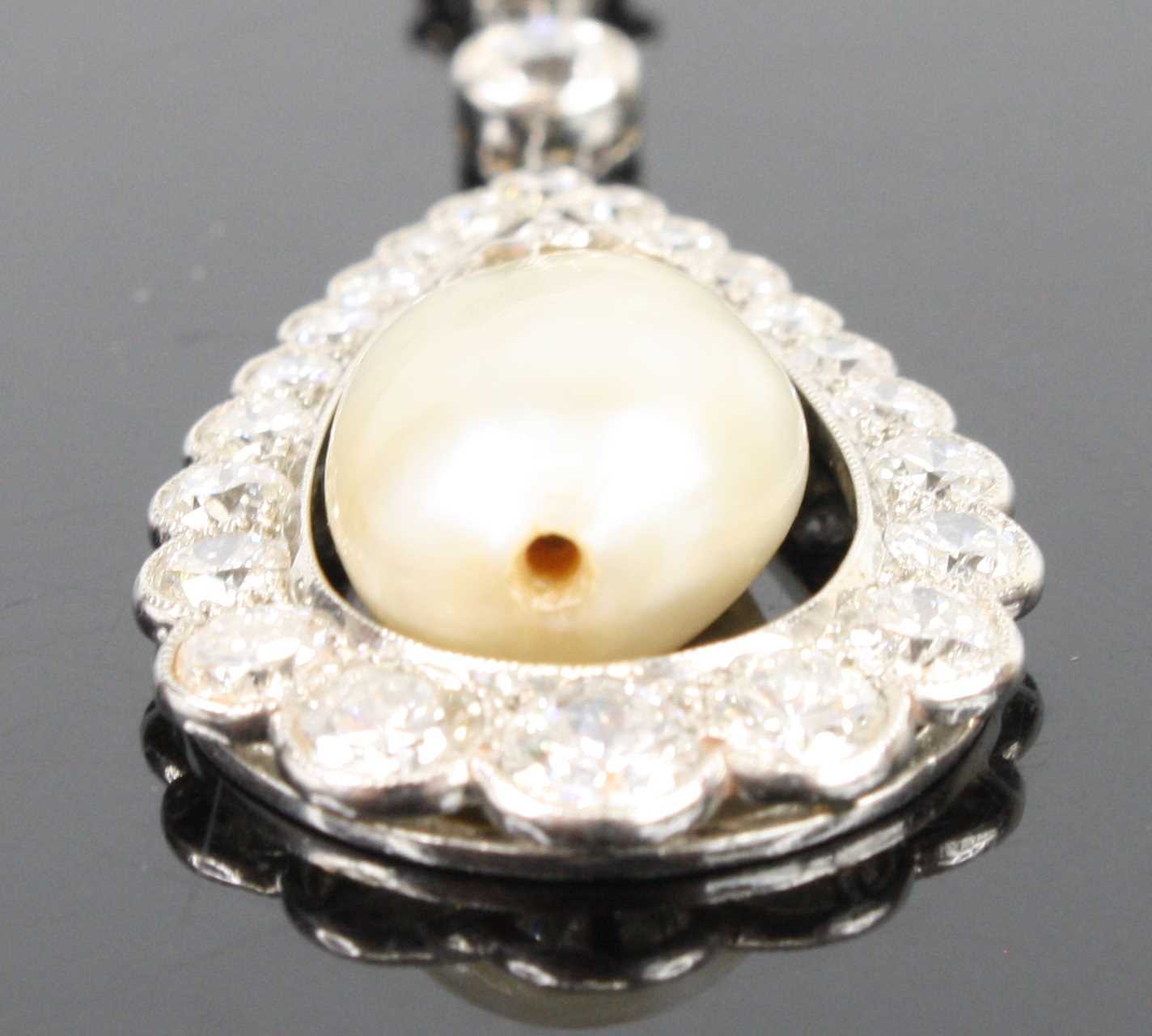 A white metal articulated pearl and diamond pear shaped cluster pendant, comprising a 16.5 x 10.15mm - Image 3 of 14