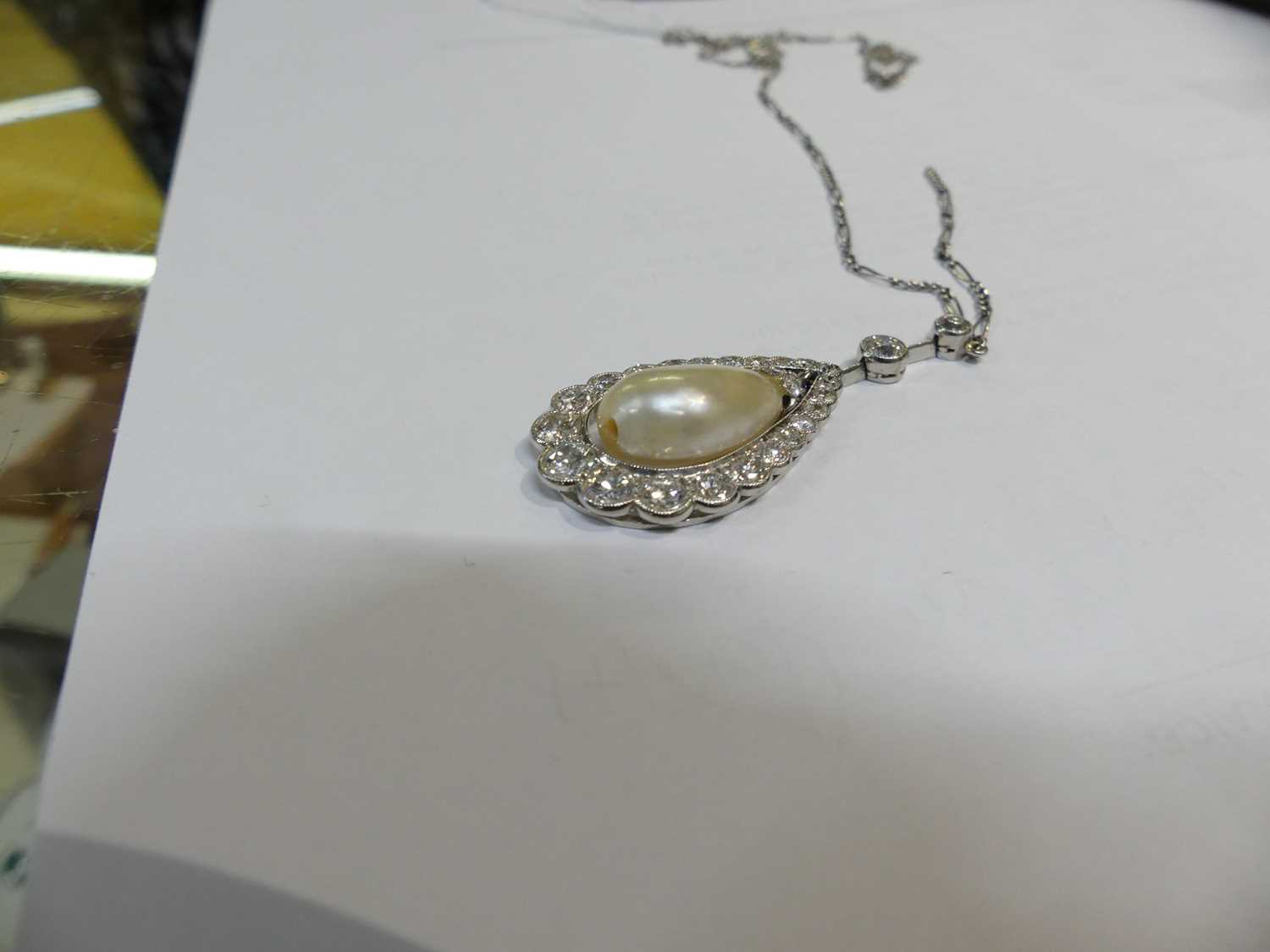 A white metal articulated pearl and diamond pear shaped cluster pendant, comprising a 16.5 x 10.15mm - Image 11 of 14