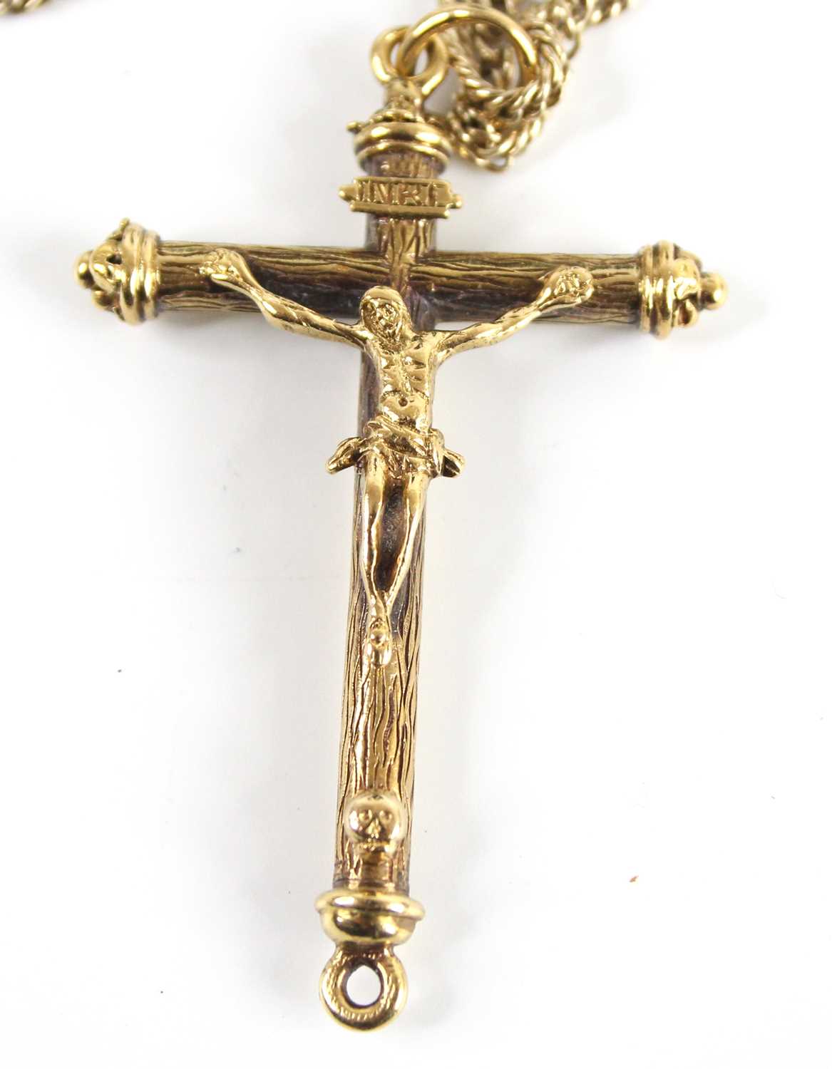 A yellow metal ornate crucifix attached to a curb link long guard chain, with swivel clasp, crucifix - Image 2 of 3